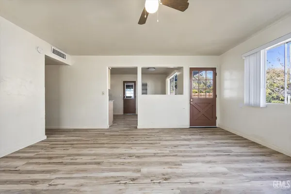 a view of an empty room with a window