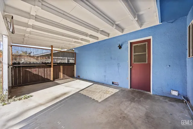 a view of a hall with wooden floor