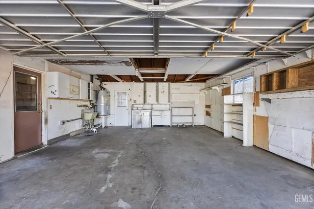 a view of a backyard with couches chairs with wooden floor
