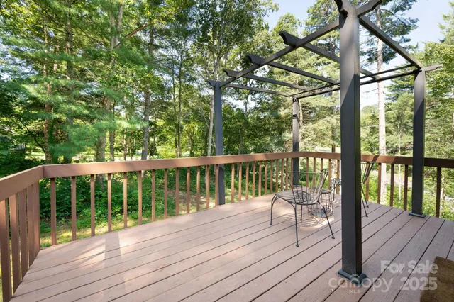 a view of balcony with wooden floor