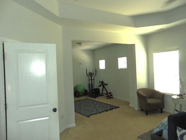 445 Piedmont Circle Covington, GA 30016 - Photo 17 of 24 a bathroom with a granite countertop sink a mirror and a shower