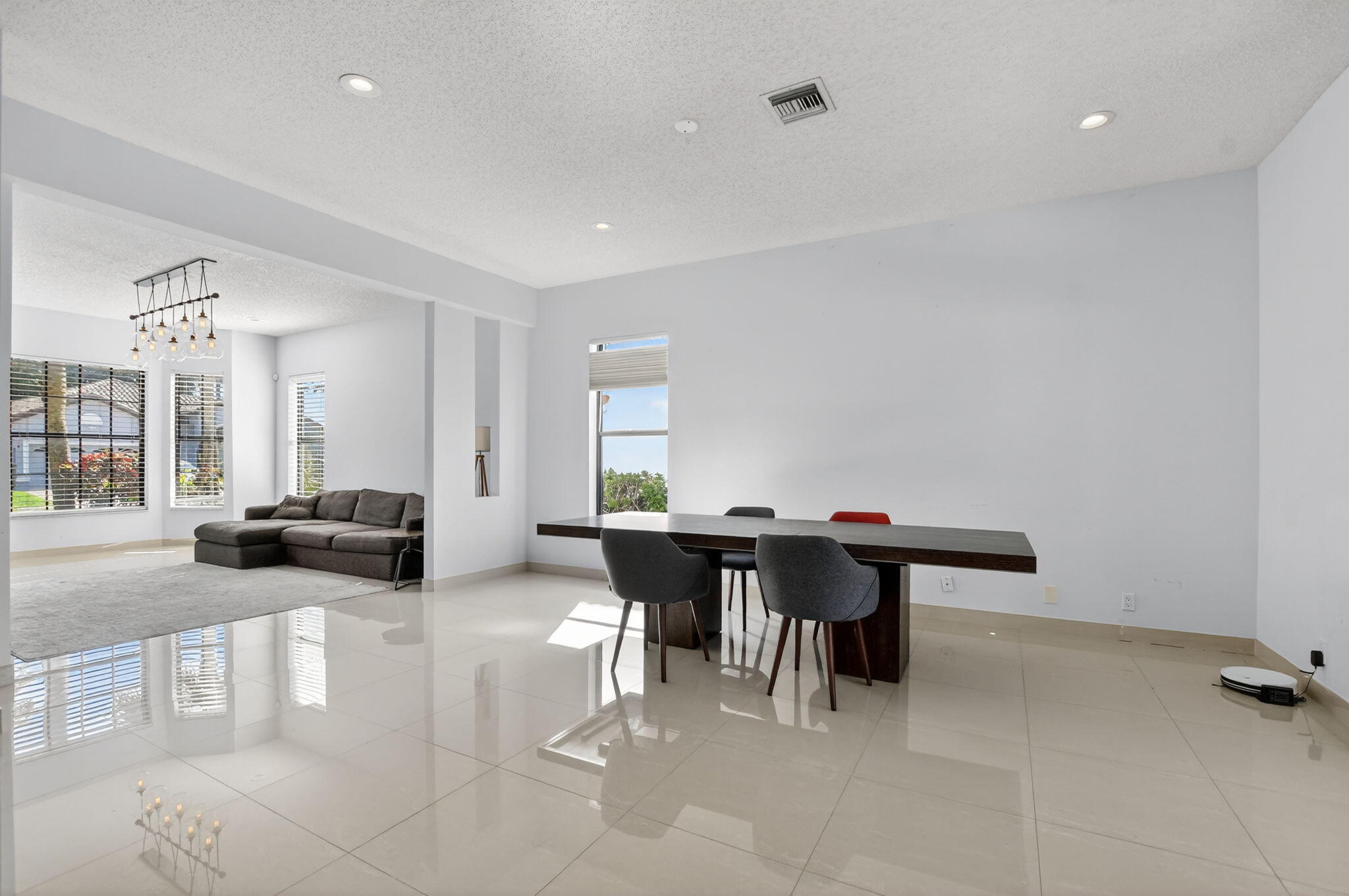 10058 Umberland Place Boca Raton, FL 33428 - Photo 11 of 55 a view of a livingroom with furniture and window