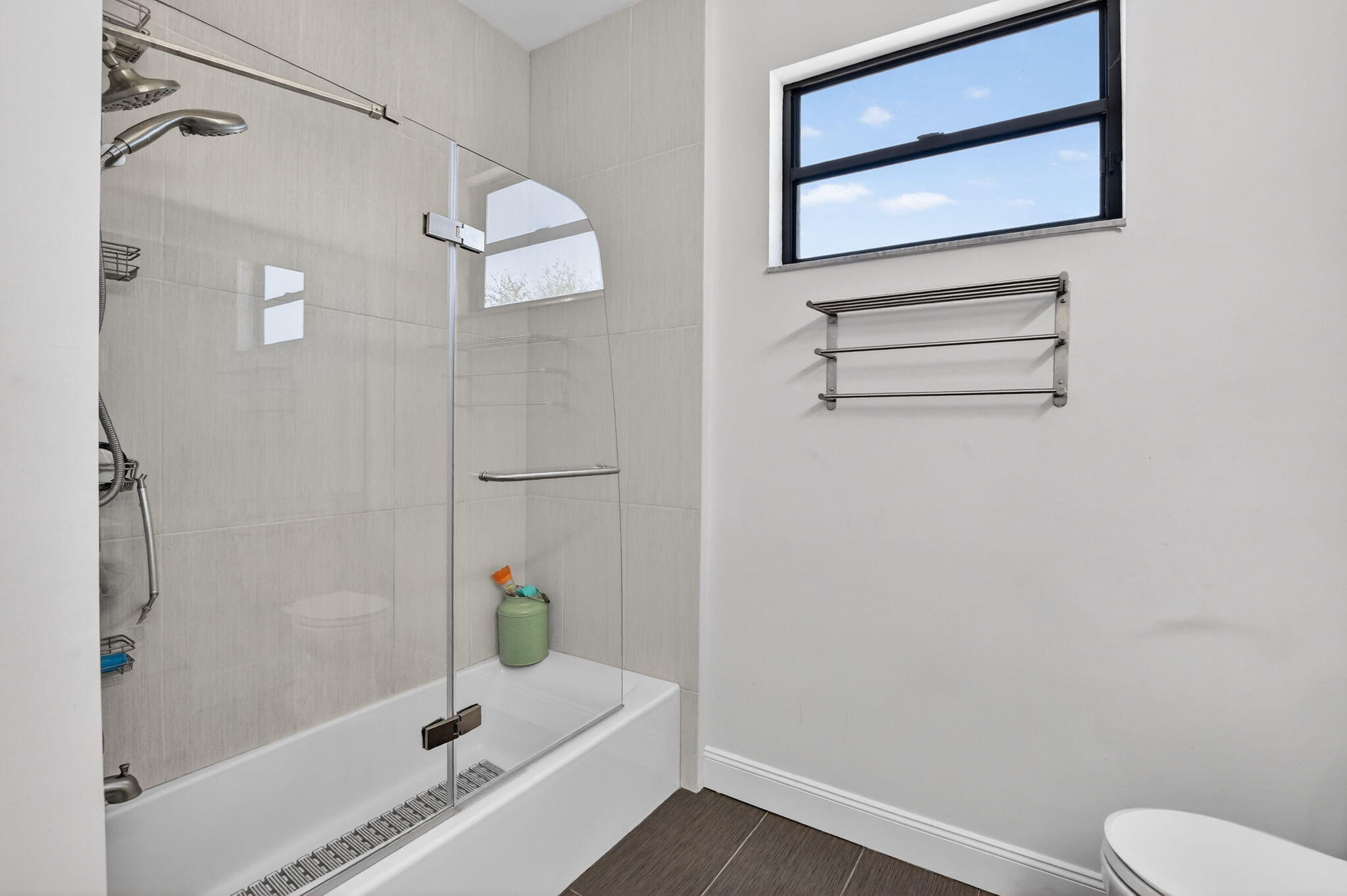 10058 Umberland Place Boca Raton, FL 33428 - Photo 32 of 55 a bathroom with a bathtub and shower