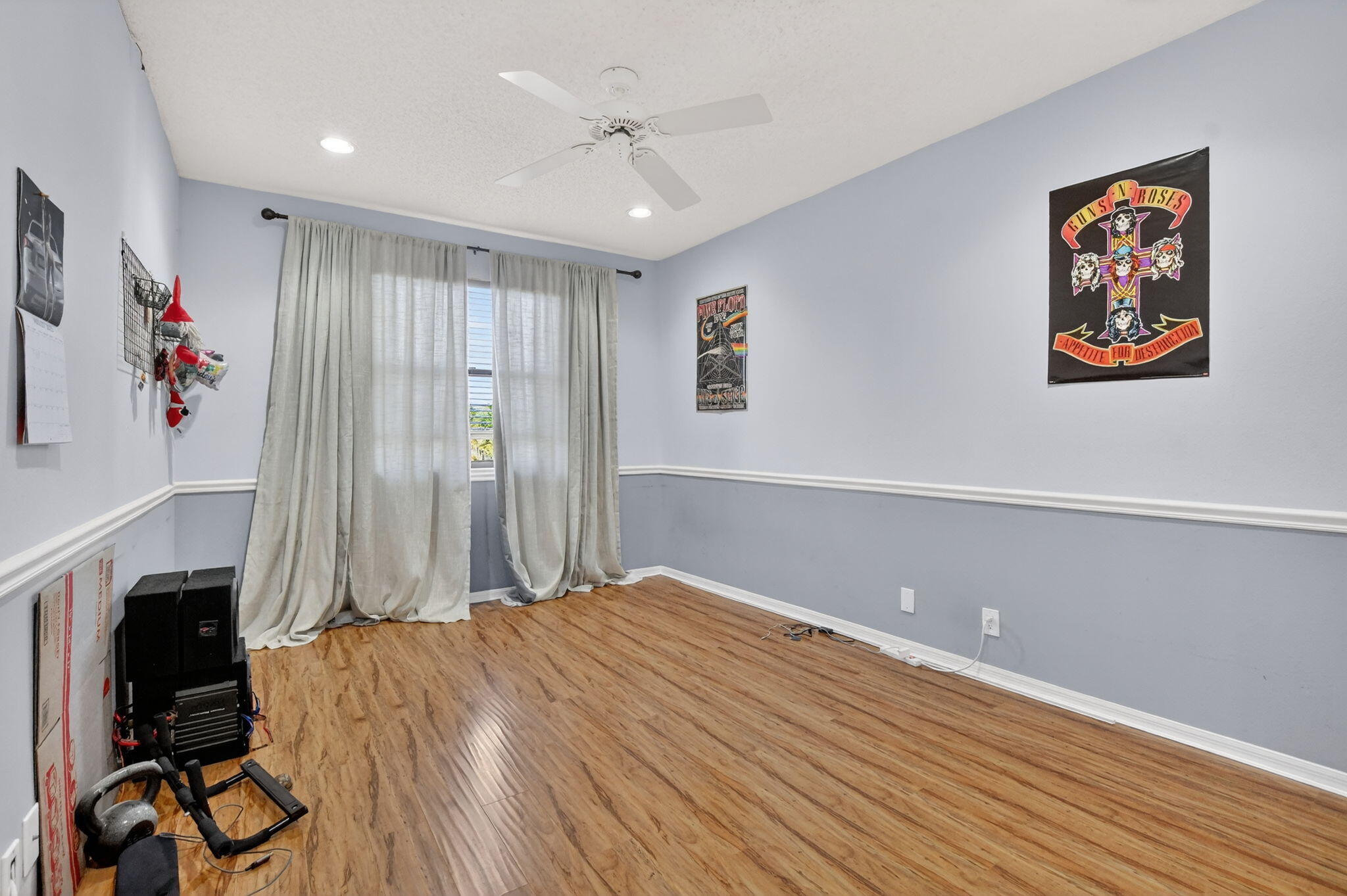 10058 Umberland Place Boca Raton, FL 33428 - Photo 33 of 55 a bedroom with a bed and a painting on the wall