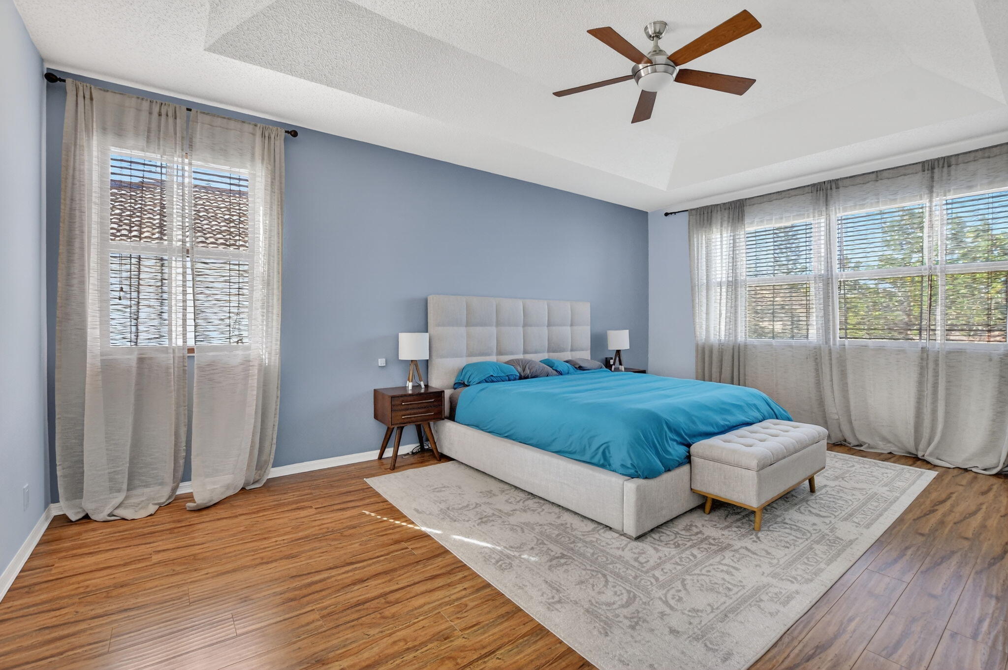 10058 Umberland Place Boca Raton, FL 33428 - Photo 36 of 55 a bedroom with a large bed and a window