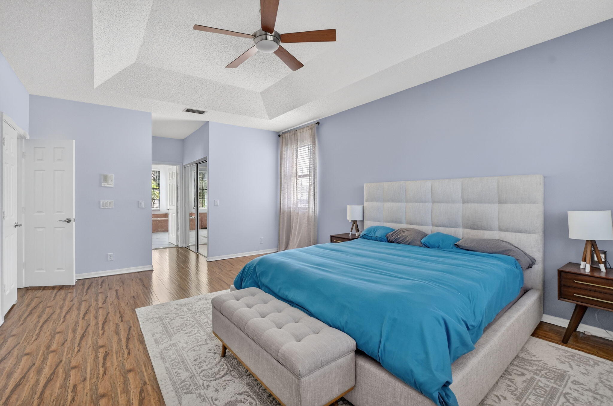 10058 Umberland Place Boca Raton, FL 33428 - Photo 37 of 55 a bedroom with a bed and closet