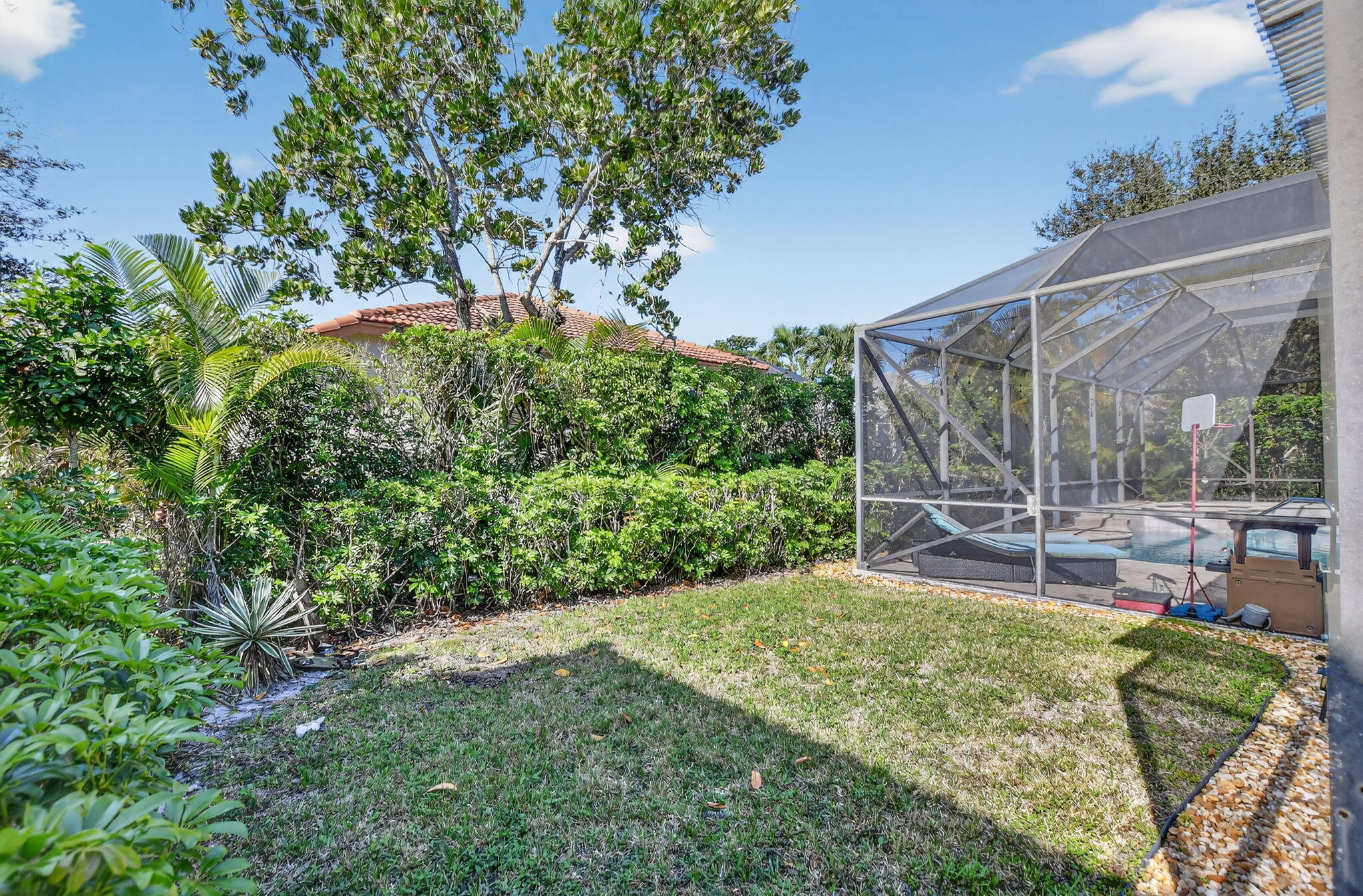 10058 Umberland Place Boca Raton, FL 33428 - Photo 47 of 55 a garden view with a seating space