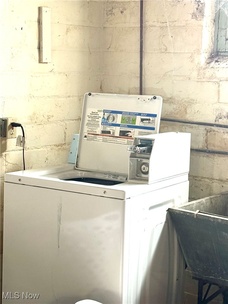 2152 Middlefield Road Cleveland, OH 44106 - Photo 39 of 50 Laundry room featuring washer / clothes dryer and sink