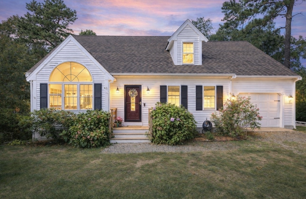 16 Balfour Lane Mashpee, MA 02649 - Photo 1 of 32 a view of house with a yard