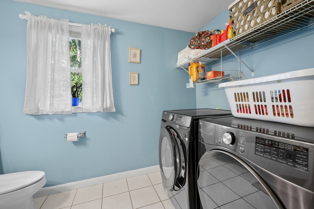 16 Balfour Lane Mashpee, MA 02649 - Photo 15 of 32 a utility room with dryer and washer