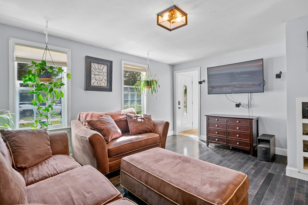 16 Balfour Lane Mashpee, MA 02649 - Photo 16 of 32 a living room with furniture and a flat screen tv