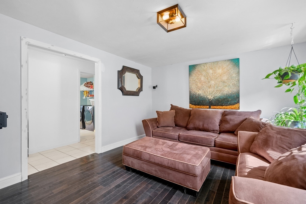 16 Balfour Lane Mashpee, MA 02649 - Photo 18 of 32 a living room with furniture and a wooden floor