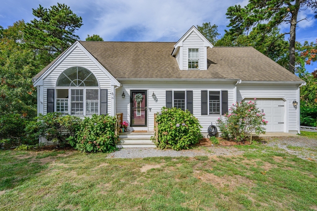 16 Balfour Lane Mashpee, MA 02649 - Photo 2 of 32 a front view of house with yard and green space