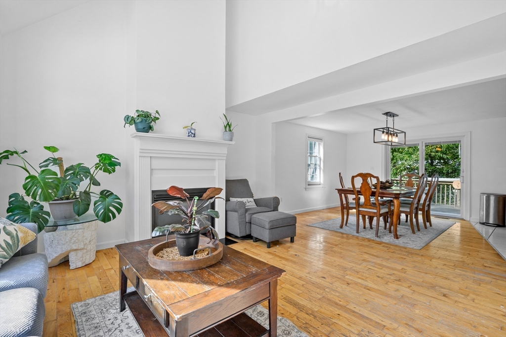 16 Balfour Lane Mashpee, MA 02649 - Photo 6 of 32 a living room with furniture and a fireplace