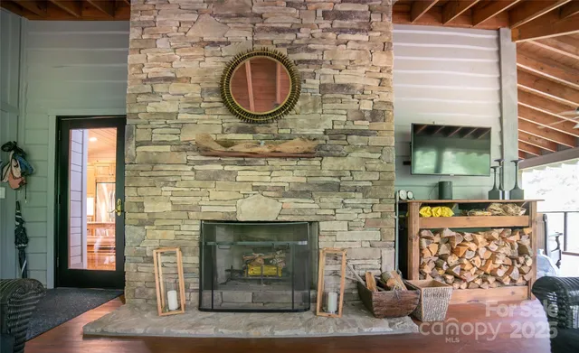 a brick fireplace with a clock on it