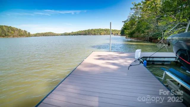 a view of a lake with green space