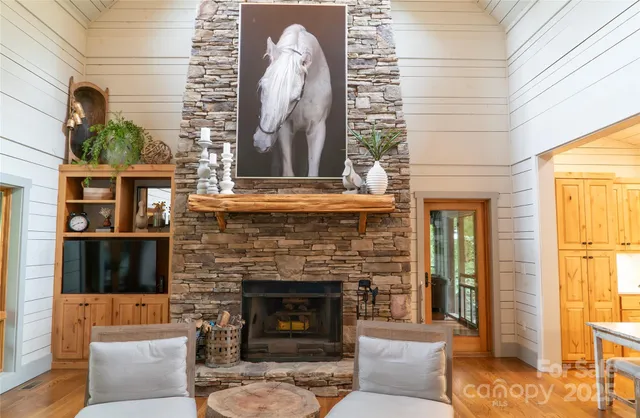 a building outdoor space with patio furniture and potted plants
