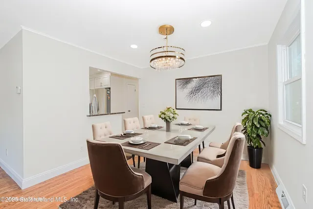 a view of a dining room with furniture