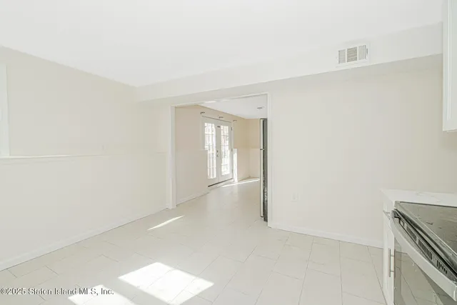 a view of entryway with bathroom