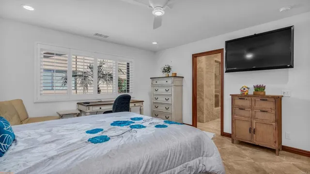 a view of a swimming pool with a yard