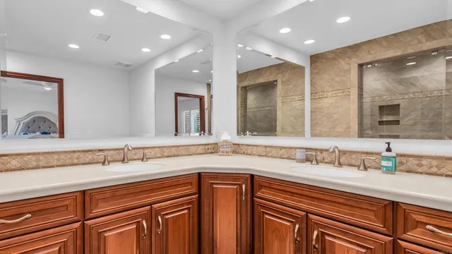 a view of a yard with plants and trees