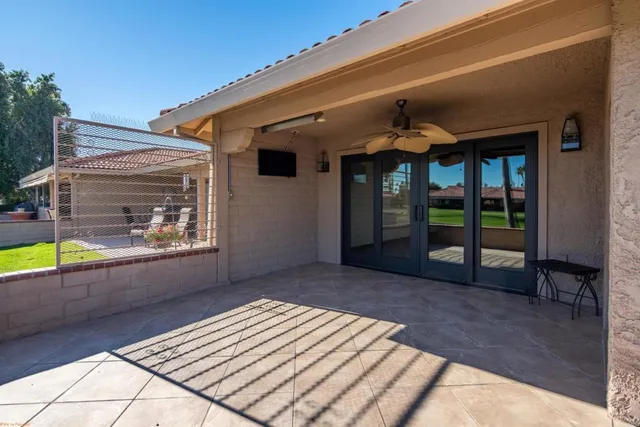 an aerial view of residential house and sandy dunes
