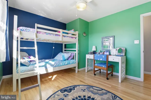 a room with furniture and a wooden floor