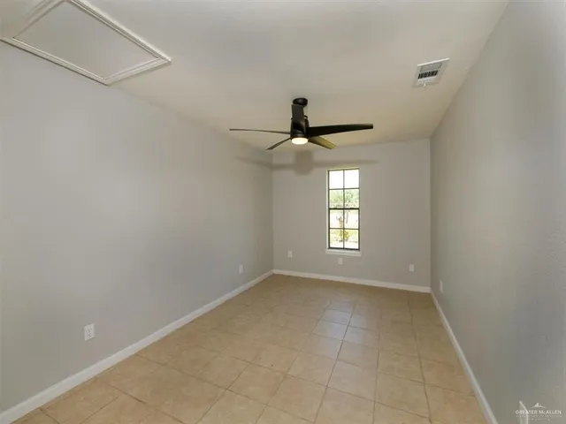 a view of an empty room and window