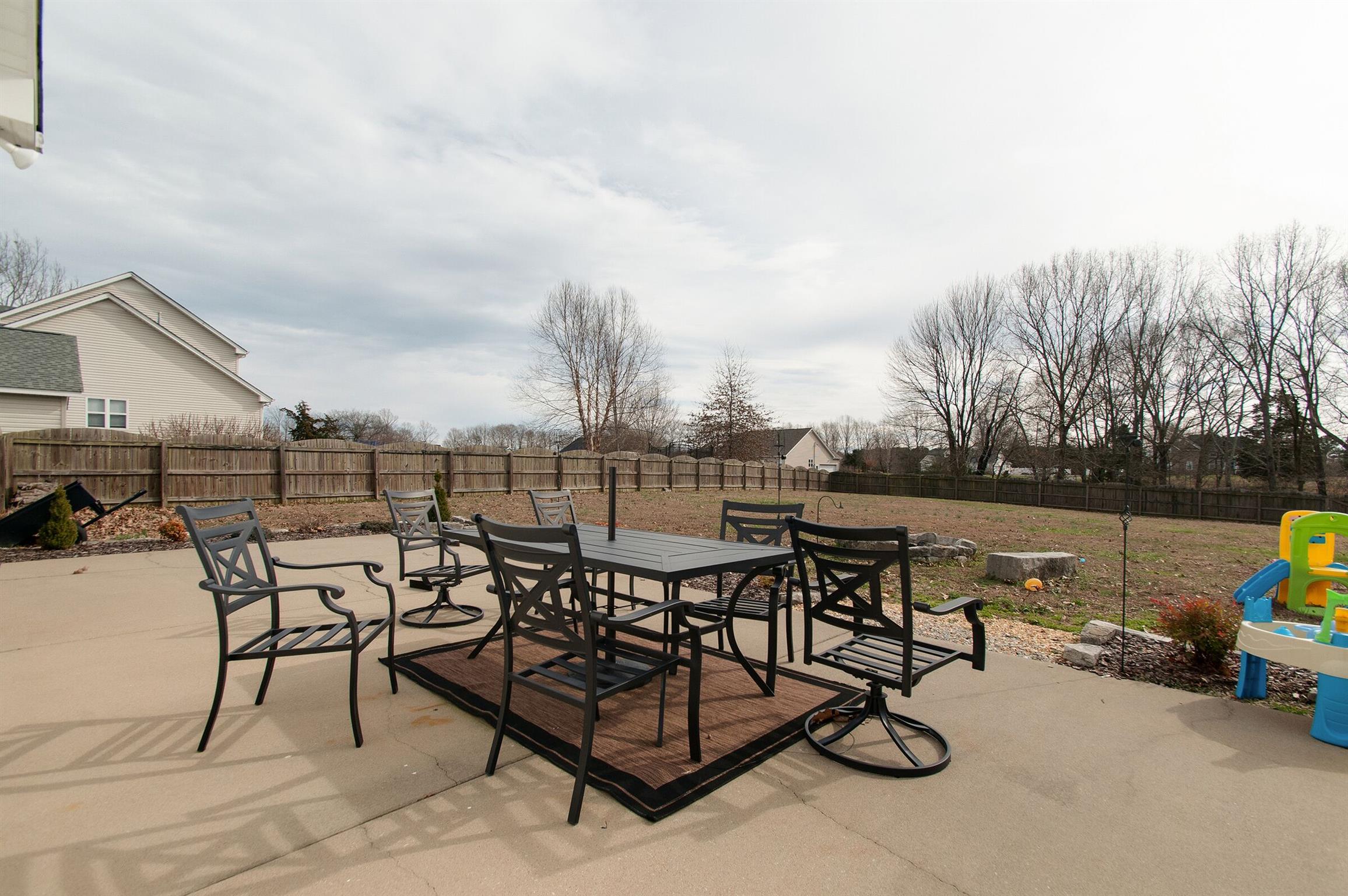 209 Contrary Road Burns, TN 37029 - Photo 14 of 17 Rear concrete patio