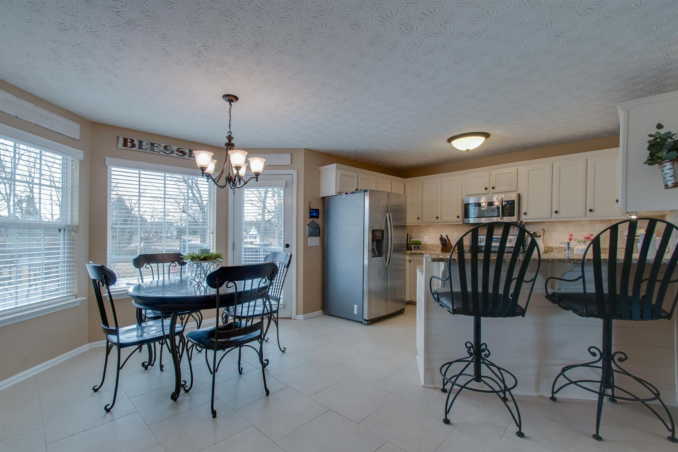 209 Contrary Road Burns, TN 37029 - Photo 6 of 17 Dinning area open to kitchen and living space