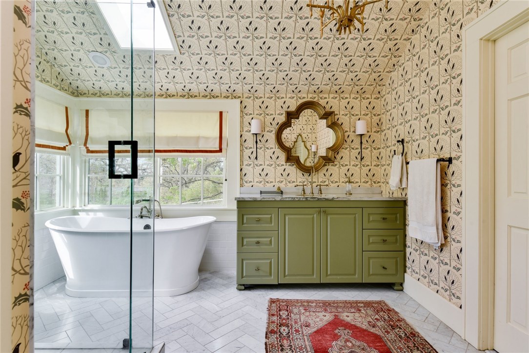 2428 Jarratt Avenue Austin, TX 78703 - Photo 1 of 1 a bathroom with a sink and mirror