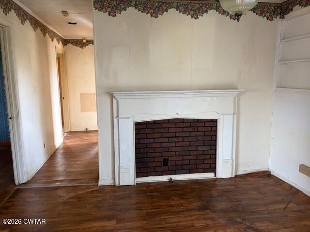 13835 Old Jackson Road Whiteville, TN 38075 - Photo 15 of 27 a view of a livingroom with wooden floor and a fireplace