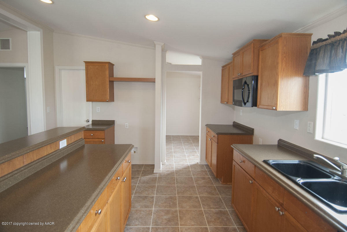 6301 Mark Road Amarillo, TX 79118 - Photo 4 of 30 KITCHEN VIEW 3