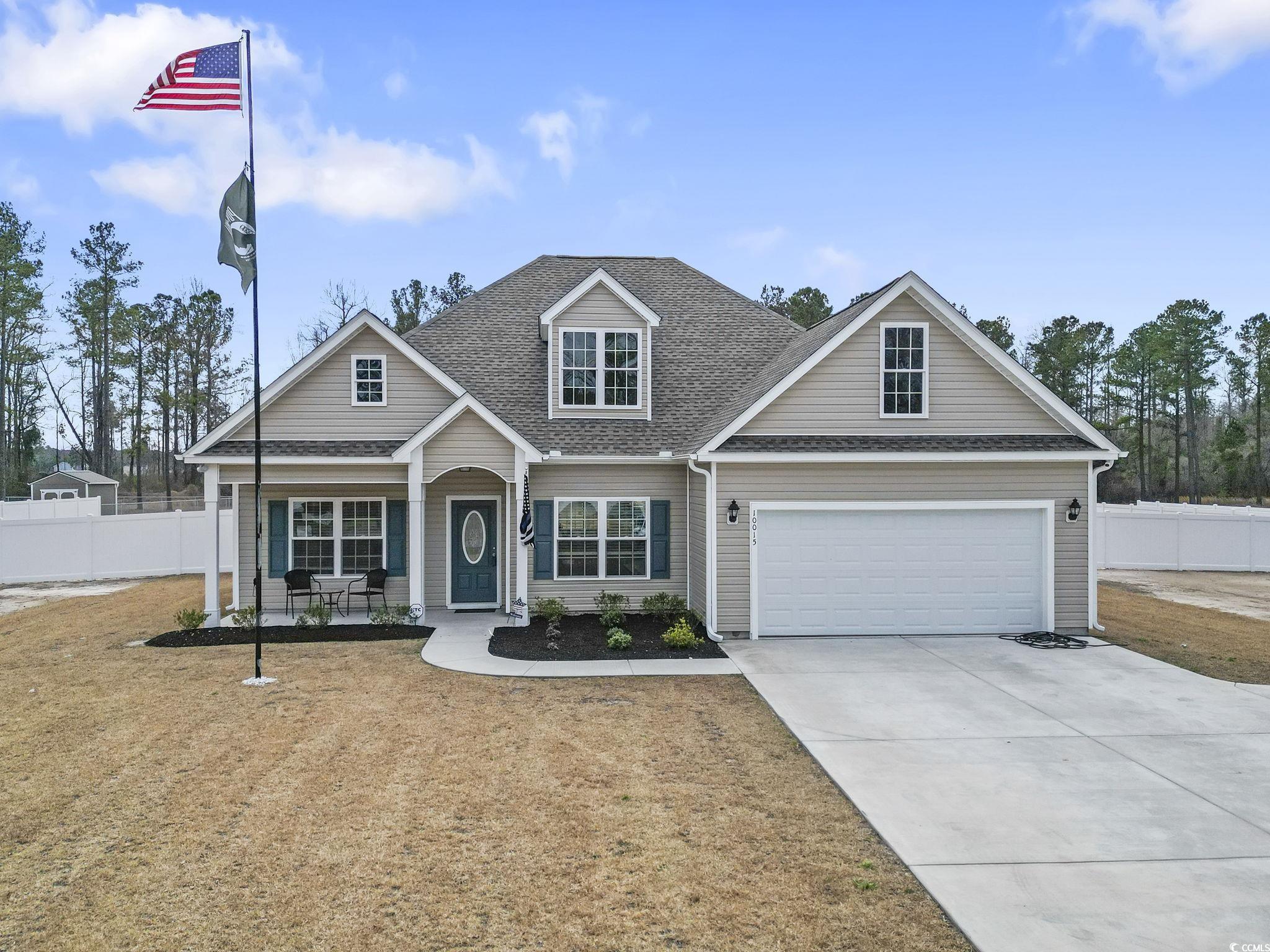 10015 West Highway 19 Loris, SC 29569 - Photo 1 of 40 View of front facade with concrete driveway, a shi