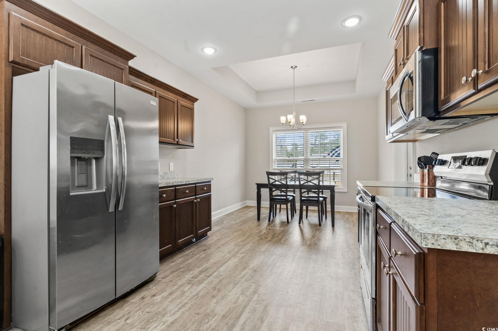 10015 West Highway 19 Loris, SC 29569 - Photo 23 of 40 Kitchen featuring stainless steel appliances, a ra