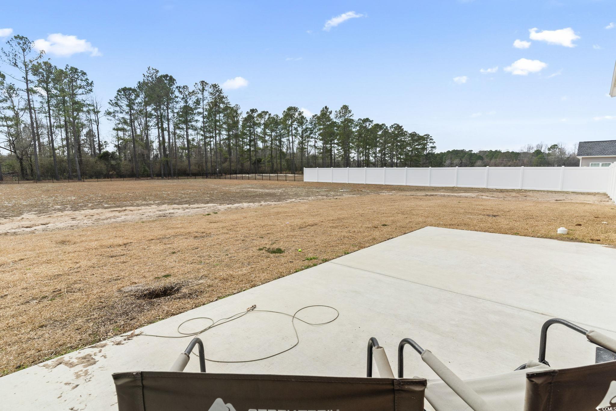 10015 West Highway 19 Loris, SC 29569 - Photo 32 of 40 View of patio featuring fence