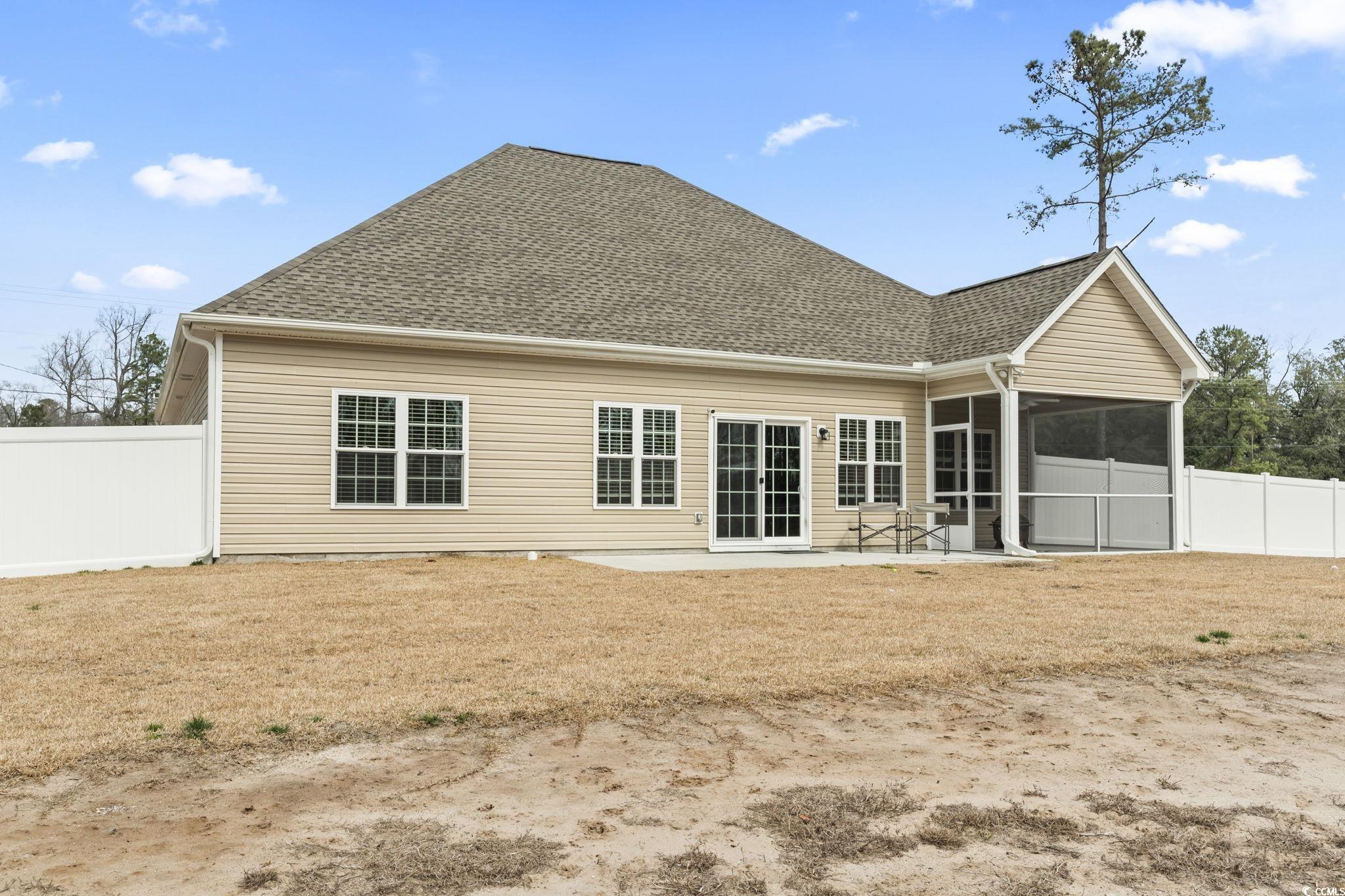 10015 West Highway 19 Loris, SC 29569 - Photo 40 of 40 Rear view of property featuring a shingled roof, a