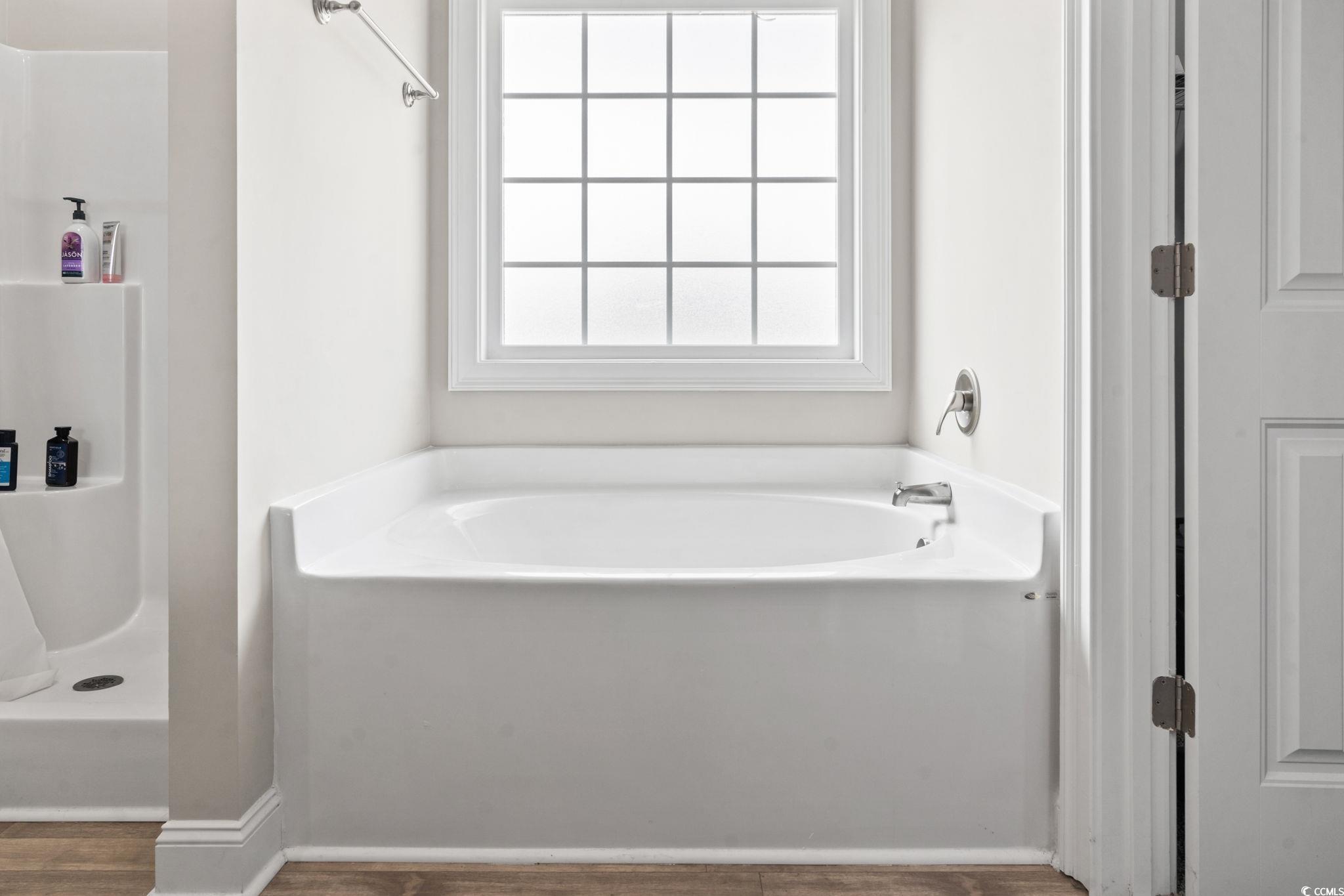 10015 West Highway 19 Loris, SC 29569 - Photo 7 of 40 Full bath featuring wood finished floors, walk in