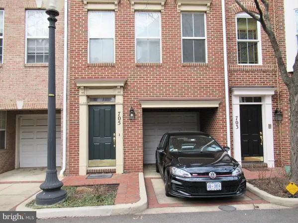 a car parked in front of a house