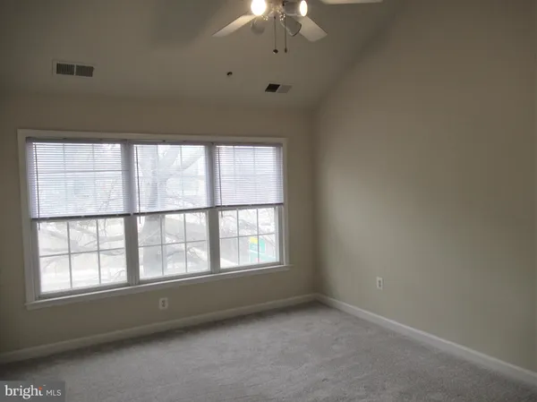 a bathroom with a sink a toilet and vanity