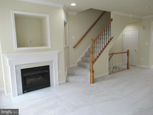 a view of a livingroom with a fireplace