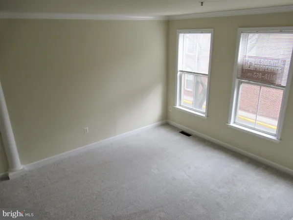 a living room with a fireplace