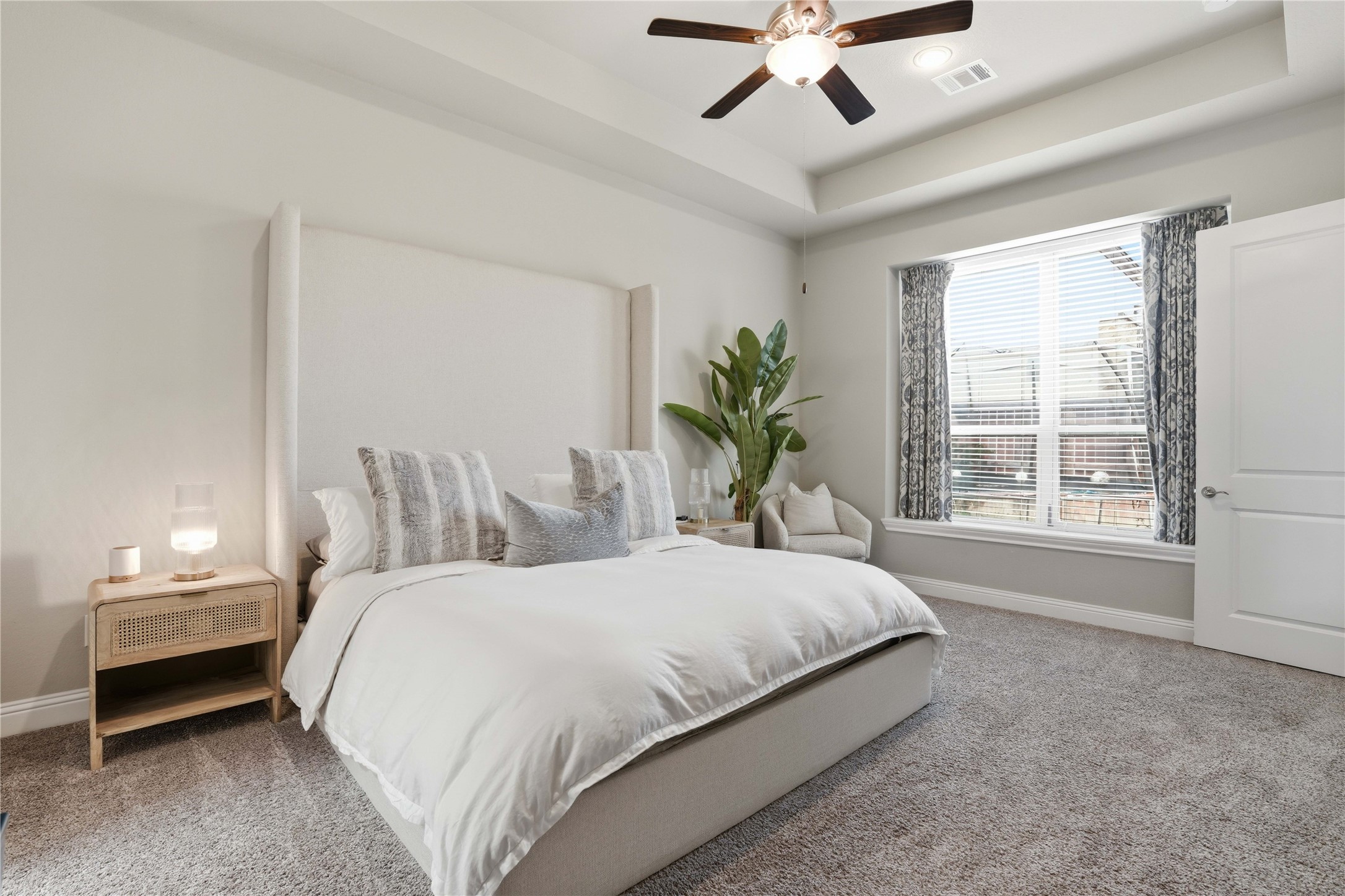 18606 Copano Lane Spring, TX 77379 - Photo 16 of 30 a bedroom with bed and windows