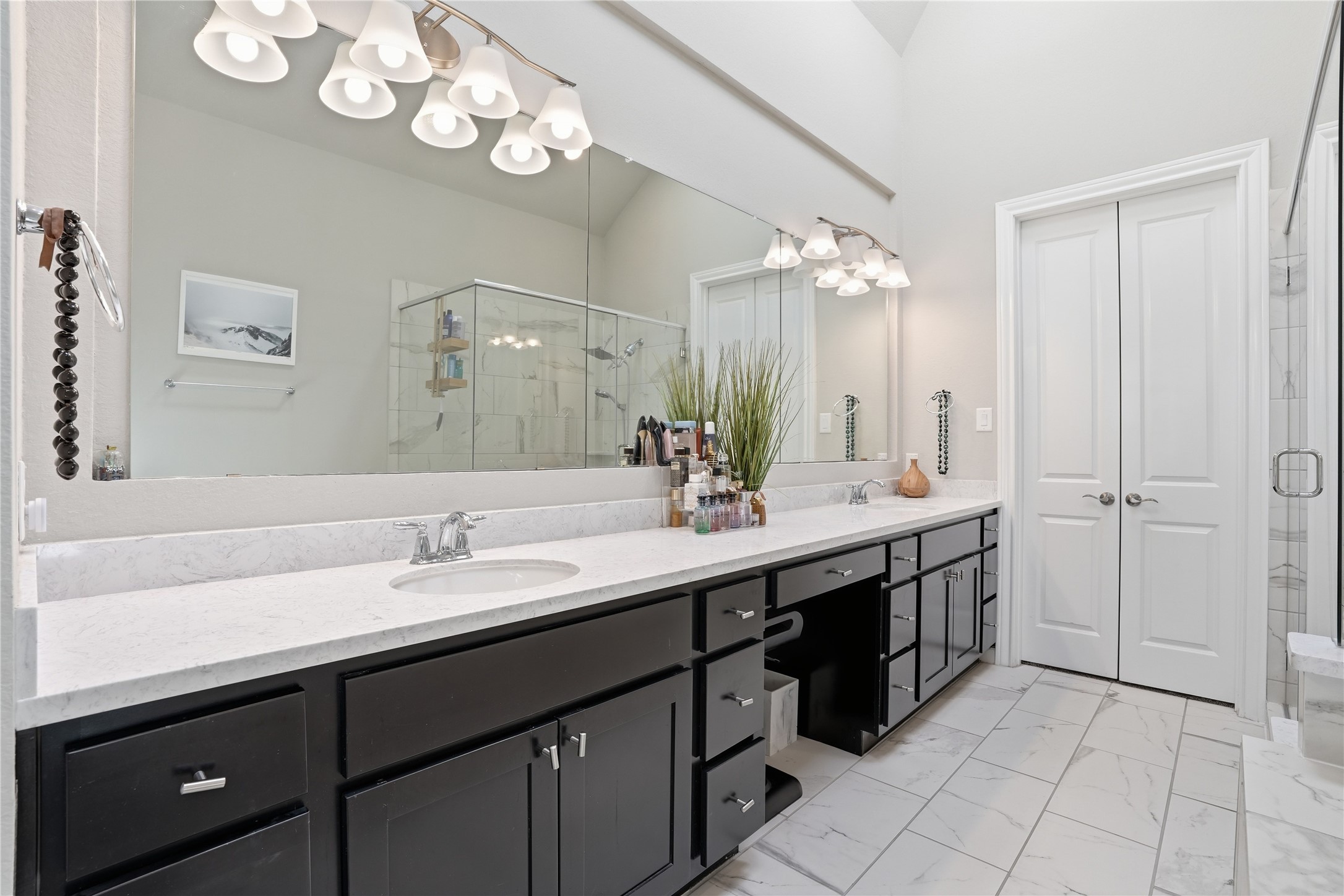 18606 Copano Lane Spring, TX 77379 - Photo 20 of 30 a bathroom with a double vanity sink and a mirror
