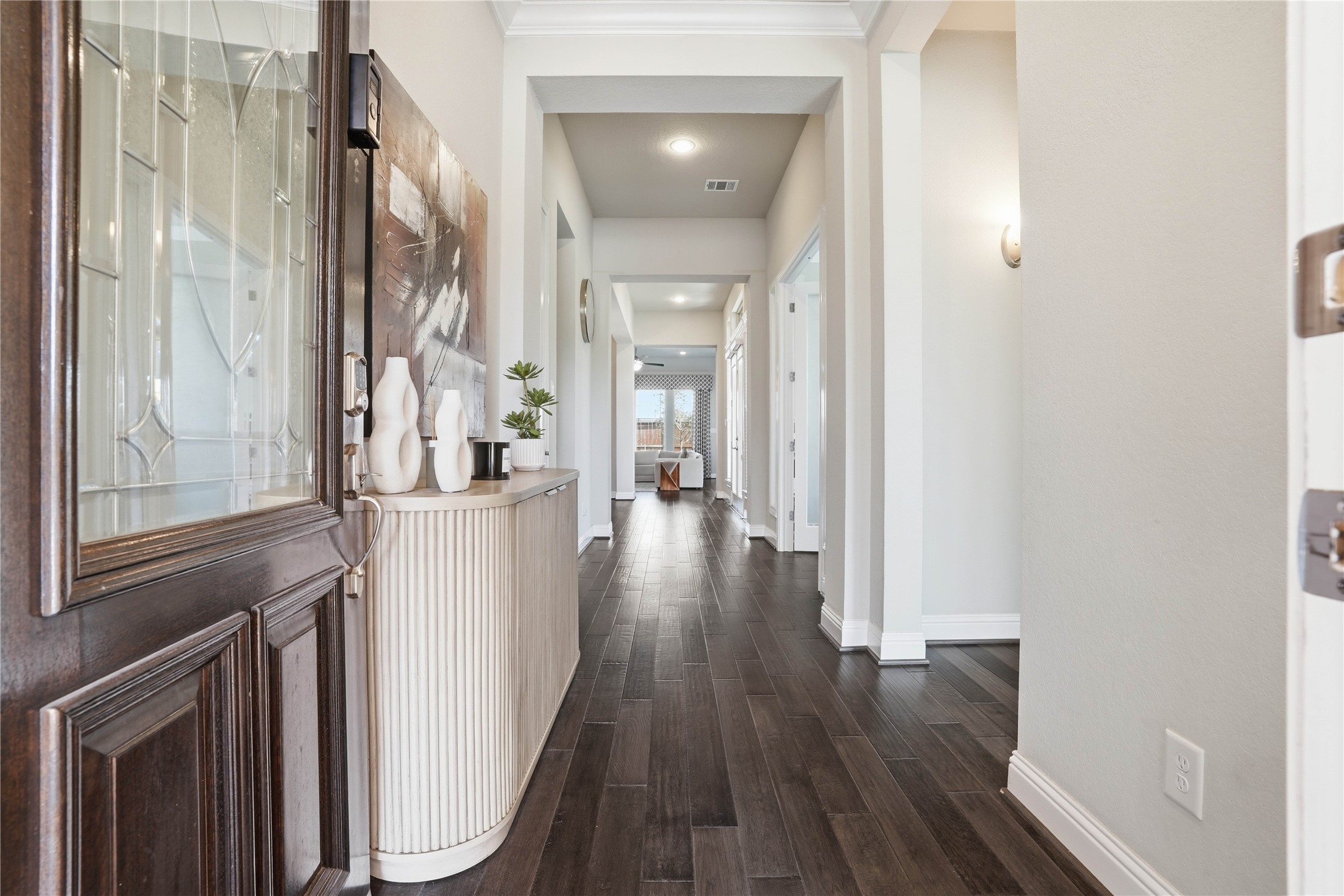 18606 Copano Lane Spring, TX 77379 - Photo 3 of 30 a view of a hallway with wooden floor and staircase