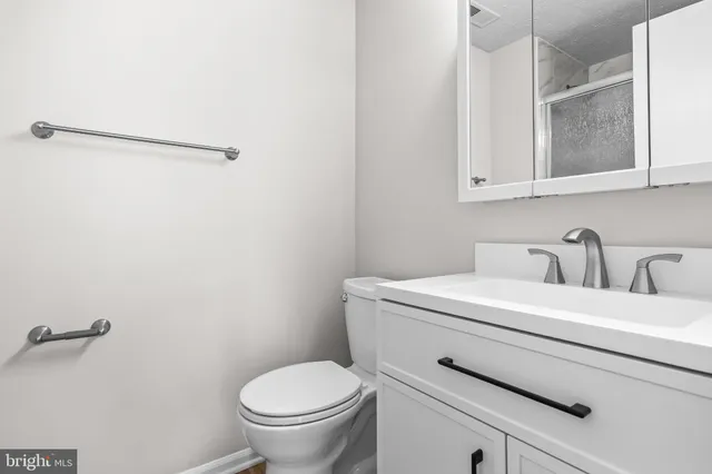 a bathroom with a sink and a toilet