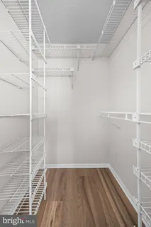 a view of a room with racks on the wall