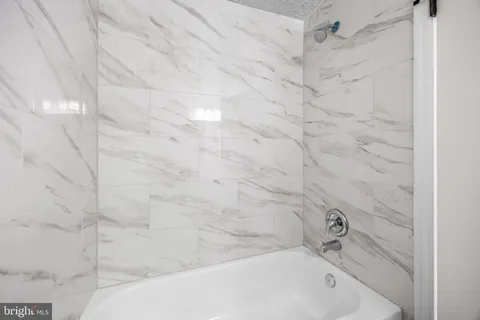 a bathroom with a bathtub