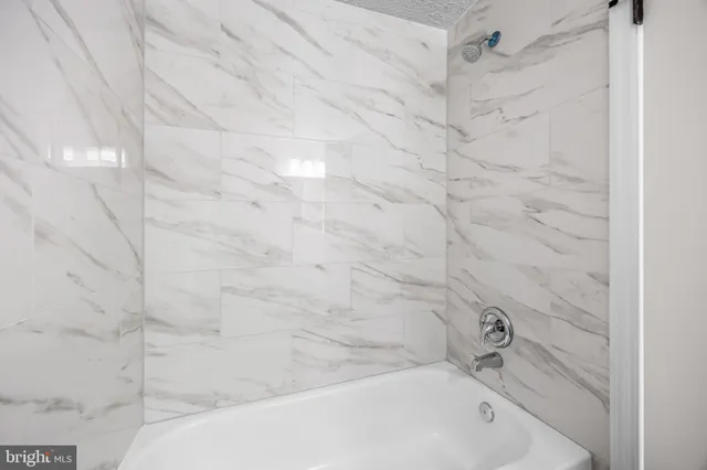 a bathroom with a bathtub