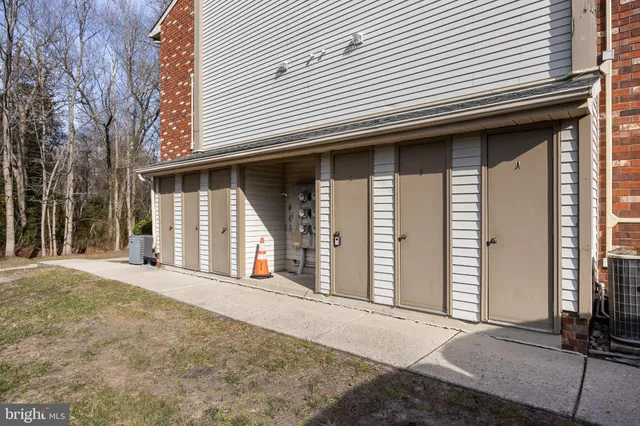 a front view of a house with a garage